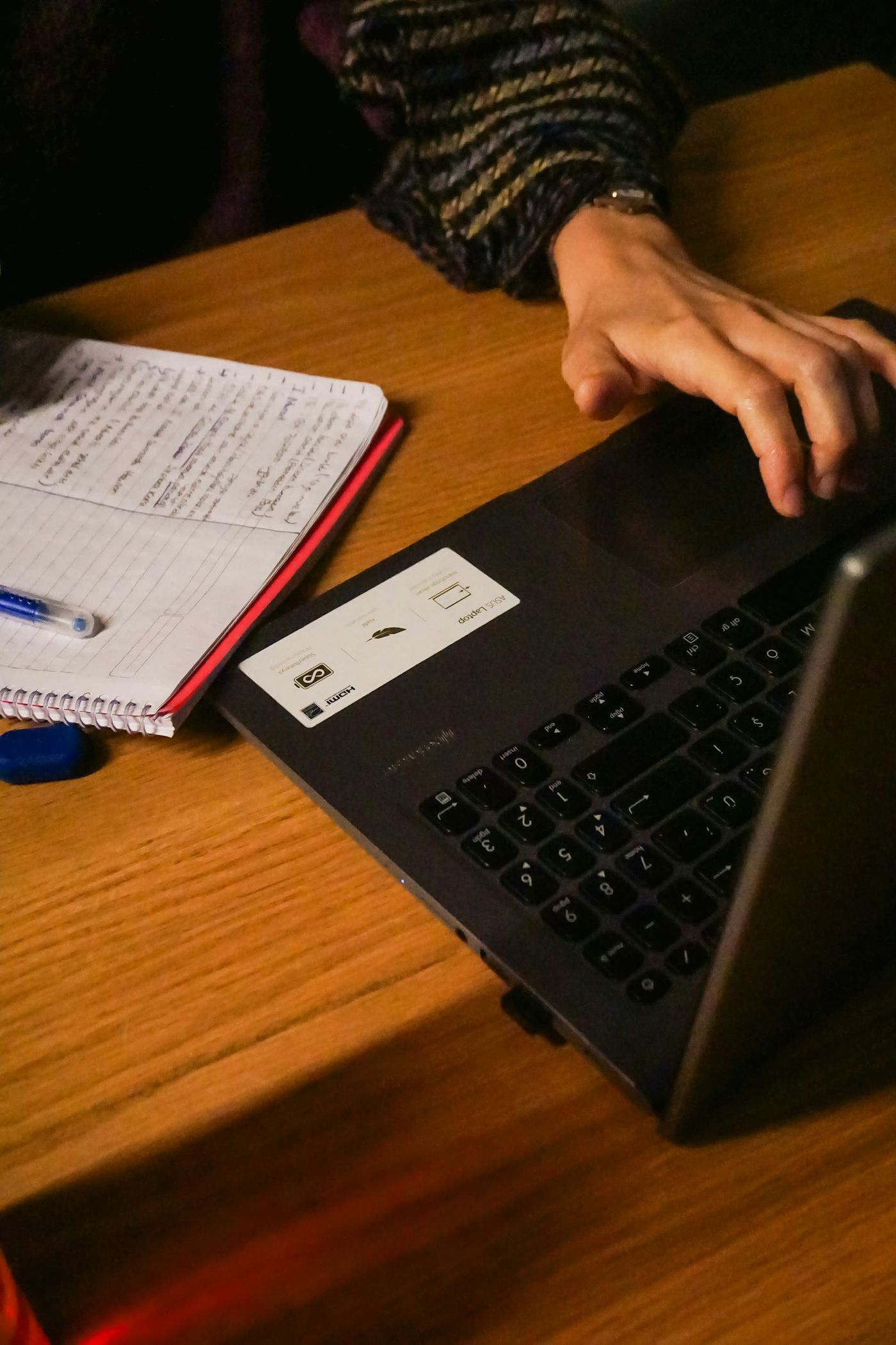A learner studying on a laptop at home